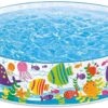Intex 56452 children’s pool with colorful beach-themed duck cartoon design, filled with water, and featuring a non-inflatable, rigid sidewall.