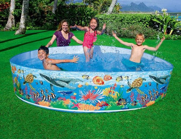 Intex 58472 children’s pool with colorful beach-themed duck cartoon design, filled with water, and featuring a non-inflatable, rigid sidewall.