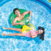 4. Bright blue Intex inflatable pool made with puncture-resistant 3-ply material.